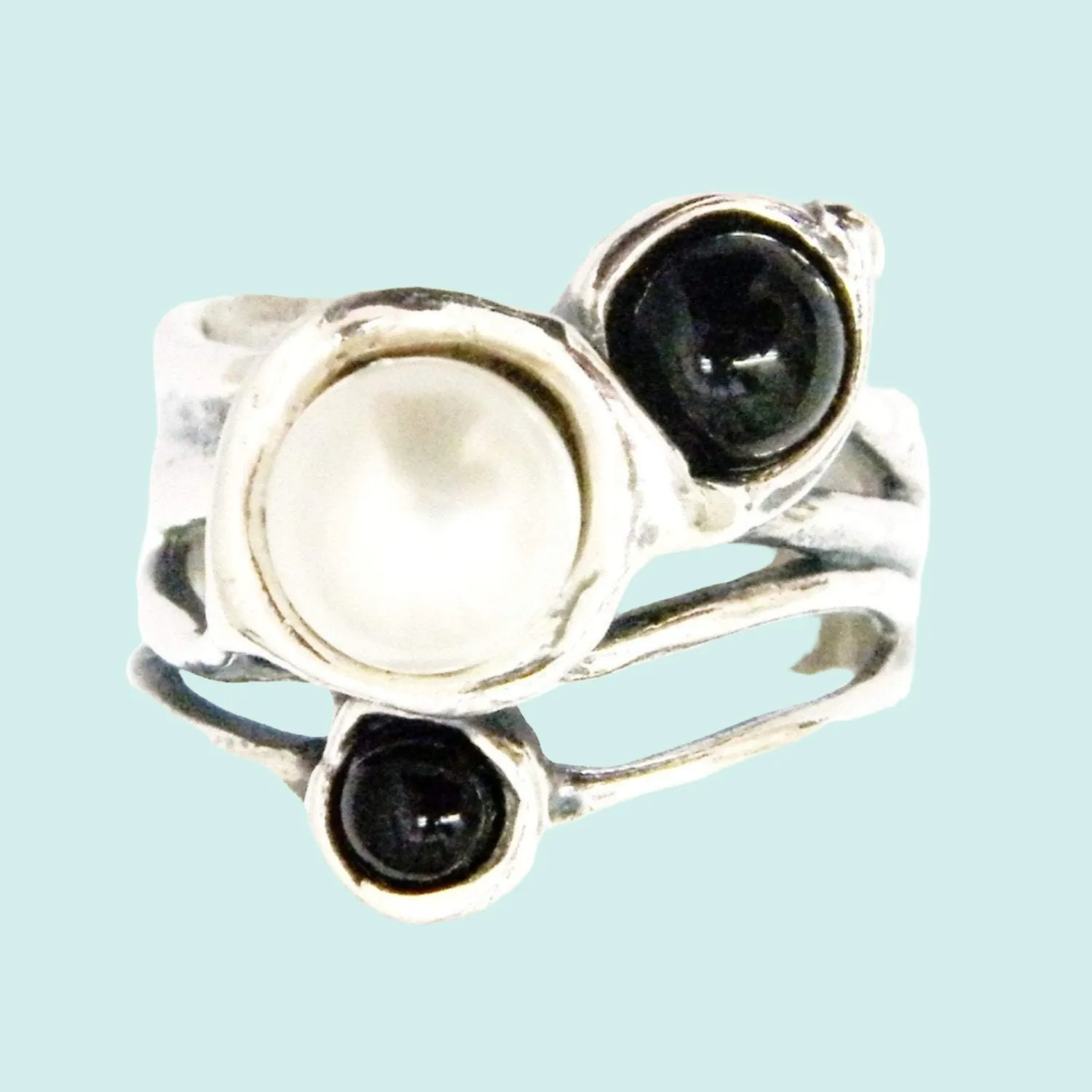 Bohemian Harmony: Sterling Silver Ring with Onyx and Pearls by Israeli Designer